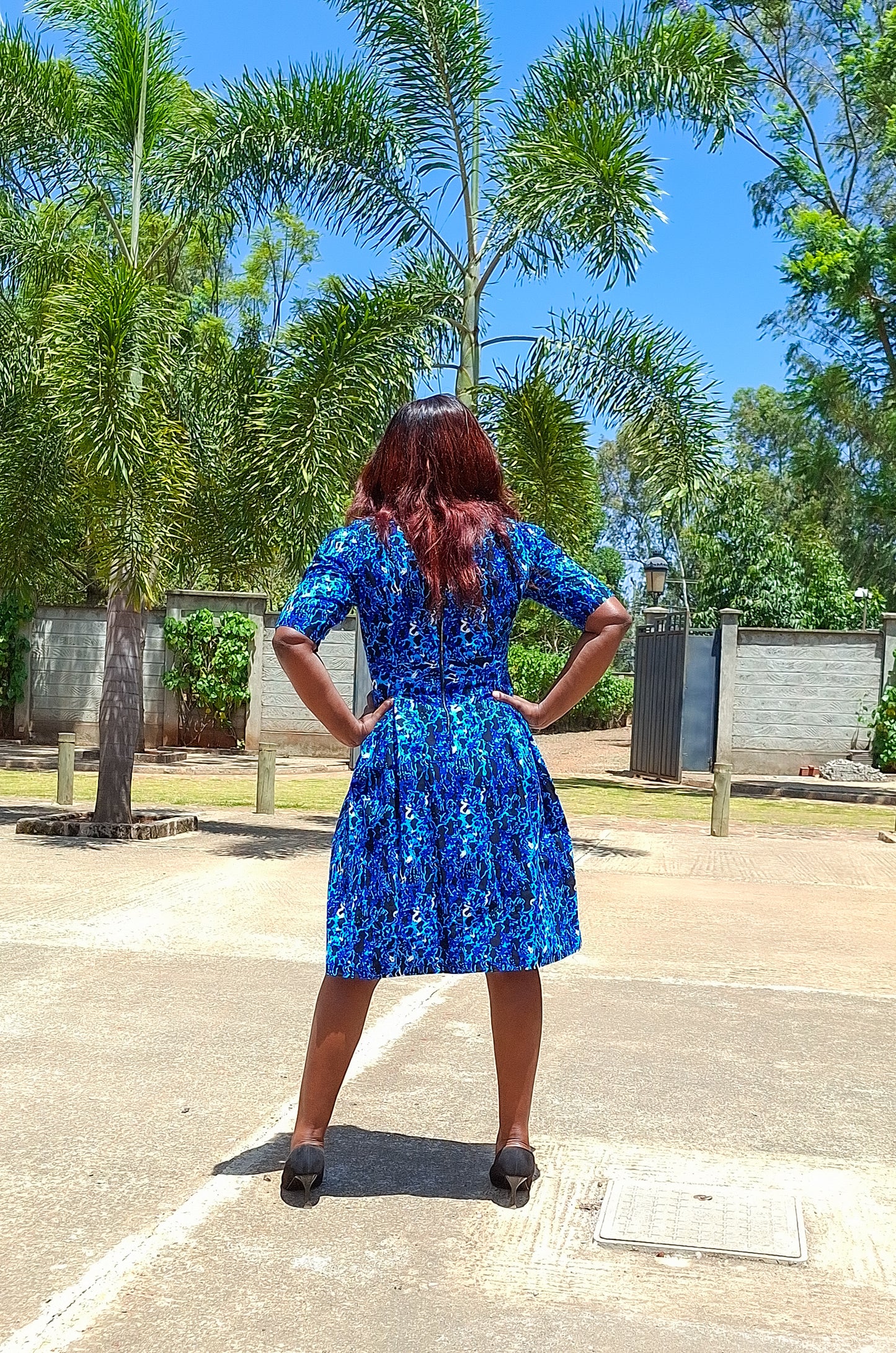 A-Line dress of black, navy blue, White and turqouise floral Motif