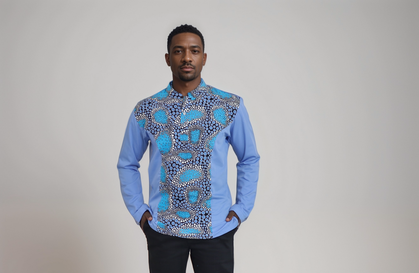 Long sleeve shirt - Two colour Mix match shirt: Light blue material on back and sides and African print material of back background, turquoise, light blue ,white circles and dots.