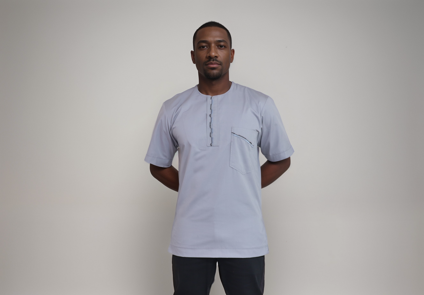 Short sleeve shirt - Light Grey color polyester/cotton. Embroidery on right shoulder, yoke and pocket flat.