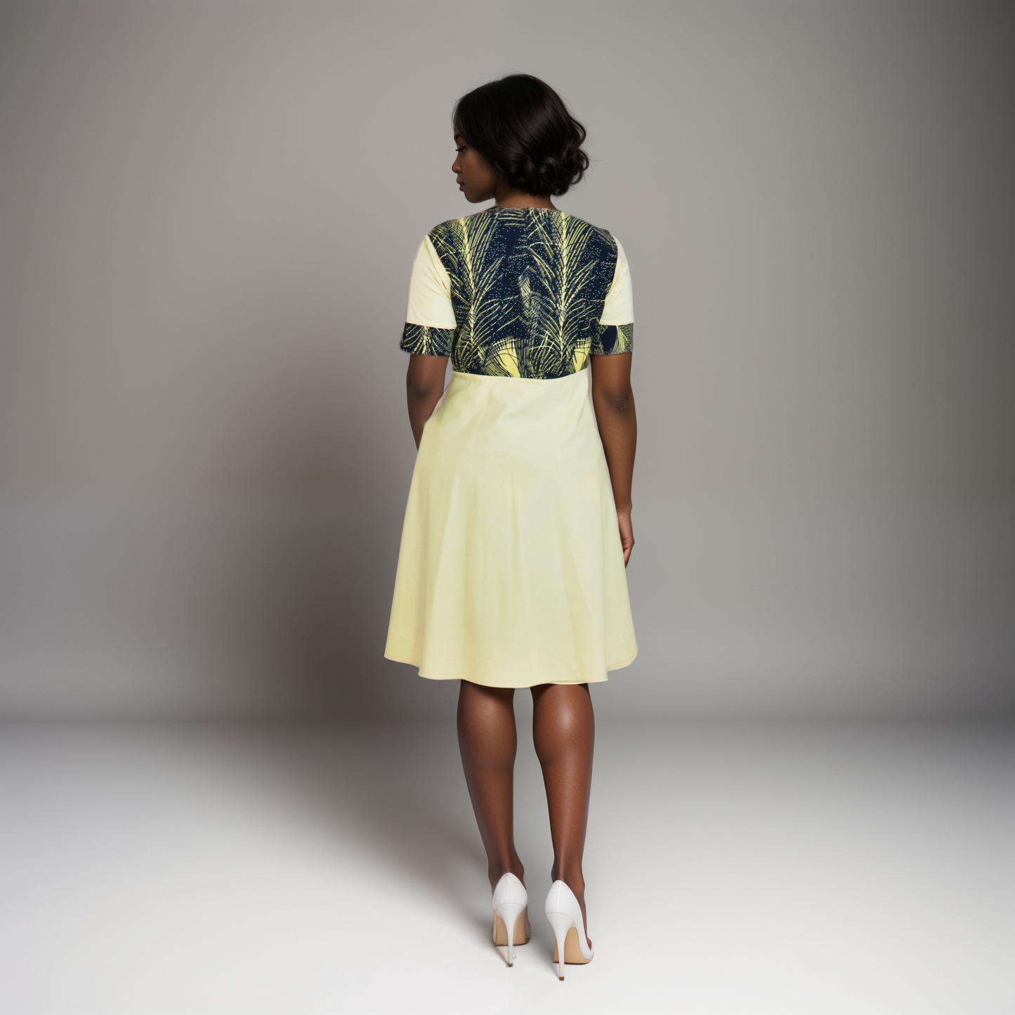 Cape dress-Black yellow and white dots and leaves motif