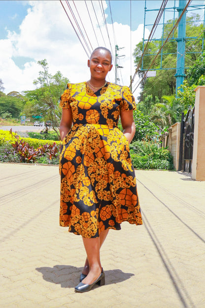 A-line dress, Orange,cream,black and black floral motif