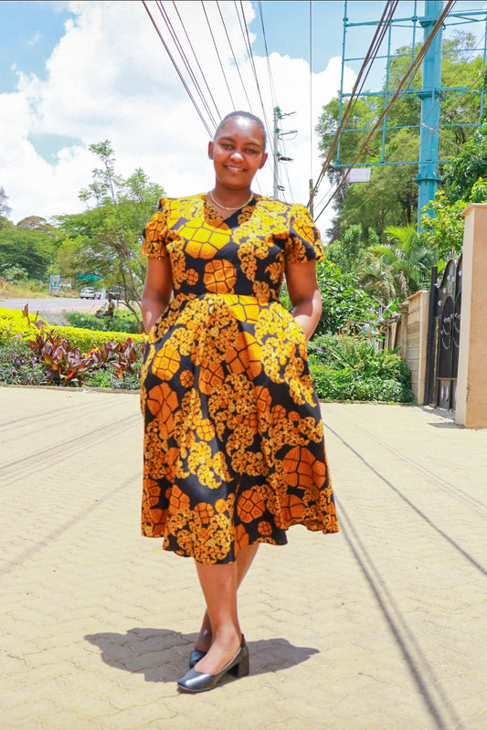 A-line dress, Orange,cream,black and black floral motif