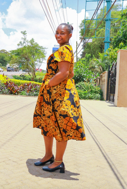 A-line dress, Orange,cream,black and black floral motif