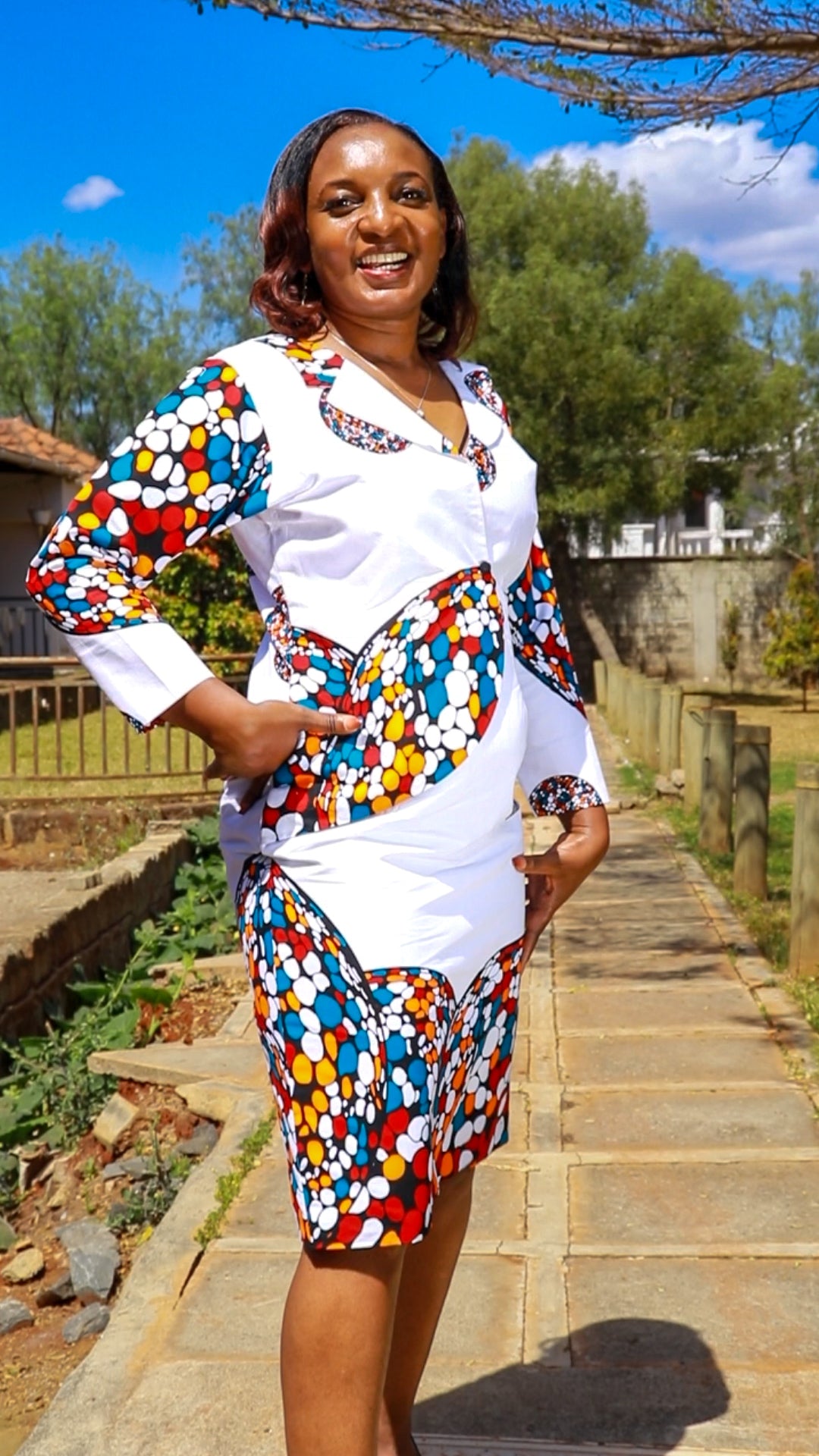 Sheath - White, circles .dots of white ,orange maroon and blue motif.