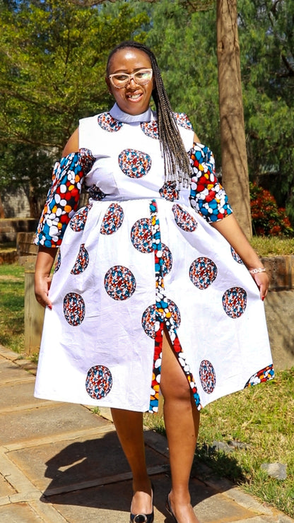 A-Line - White, circles and dots of white ,orange maroon and blue.