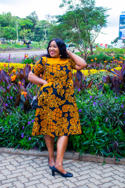 A-Line dress of Gold, black orange and  cream floral motif