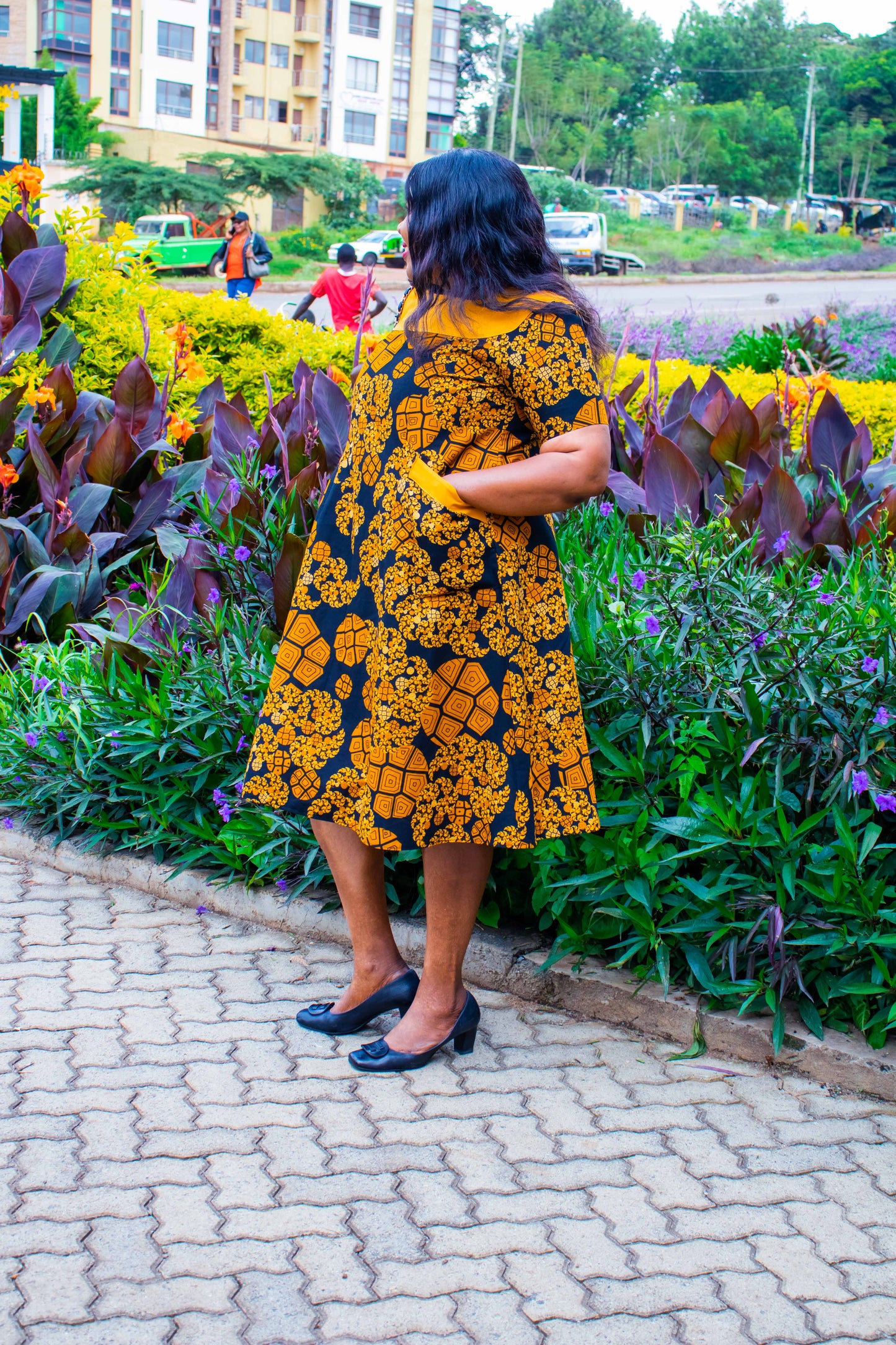 A-Line dress of Gold, black orange and  cream floral motif