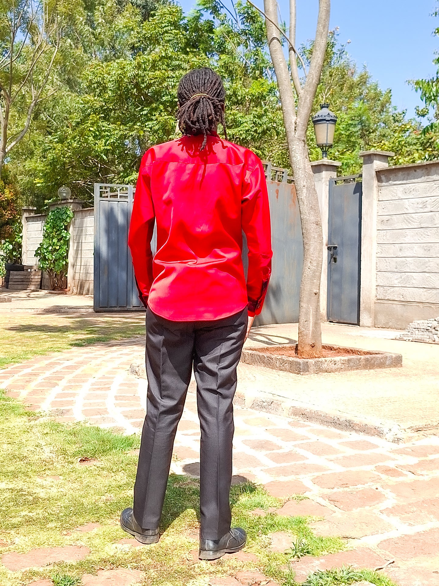 Casual Smart 2 Piece:  Plain red shirt. Constrast of African Print of red and black .
