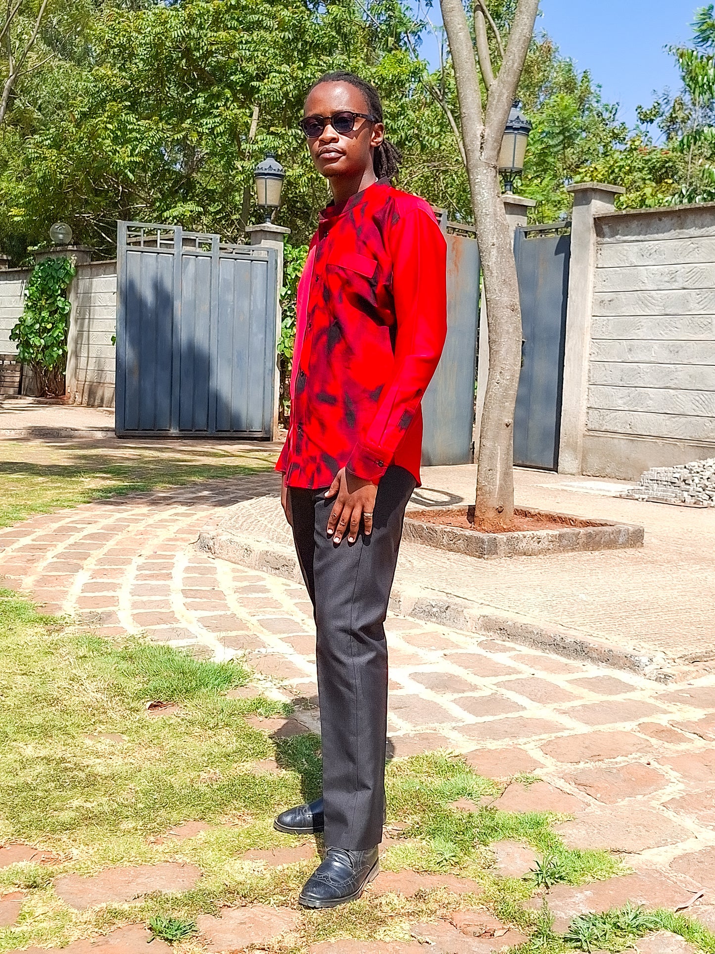 Casual Smart 2 Piece:  Plain red shirt. Constrast of African Print of red and black .