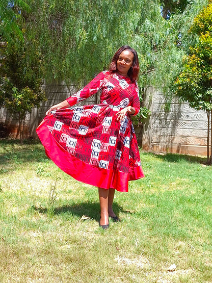 Rufflette dress-red, black and white motif with red contrast