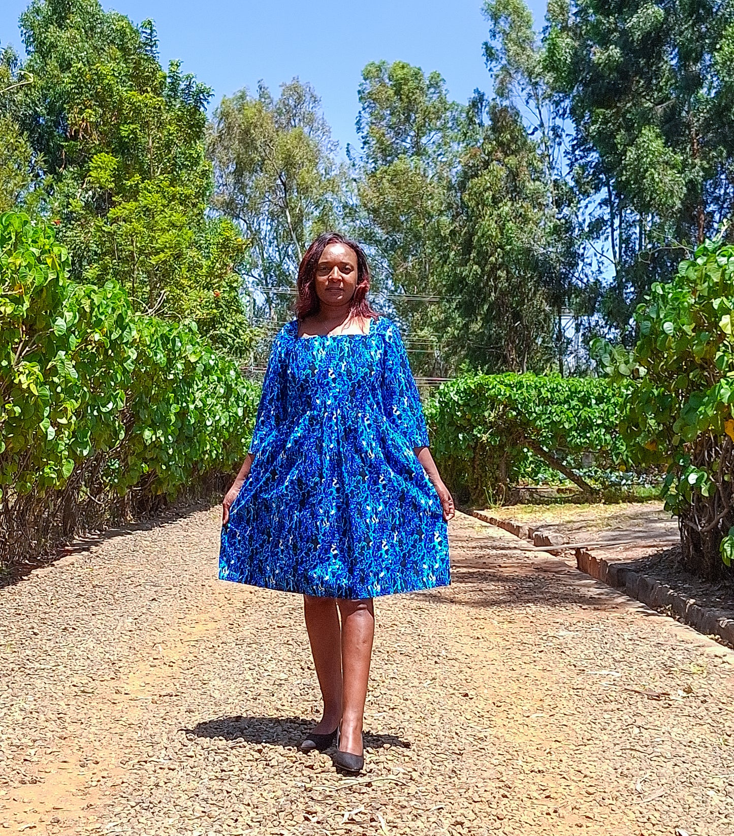 A-Line dress of black, navy blue, White  and turqouise floral  Motif