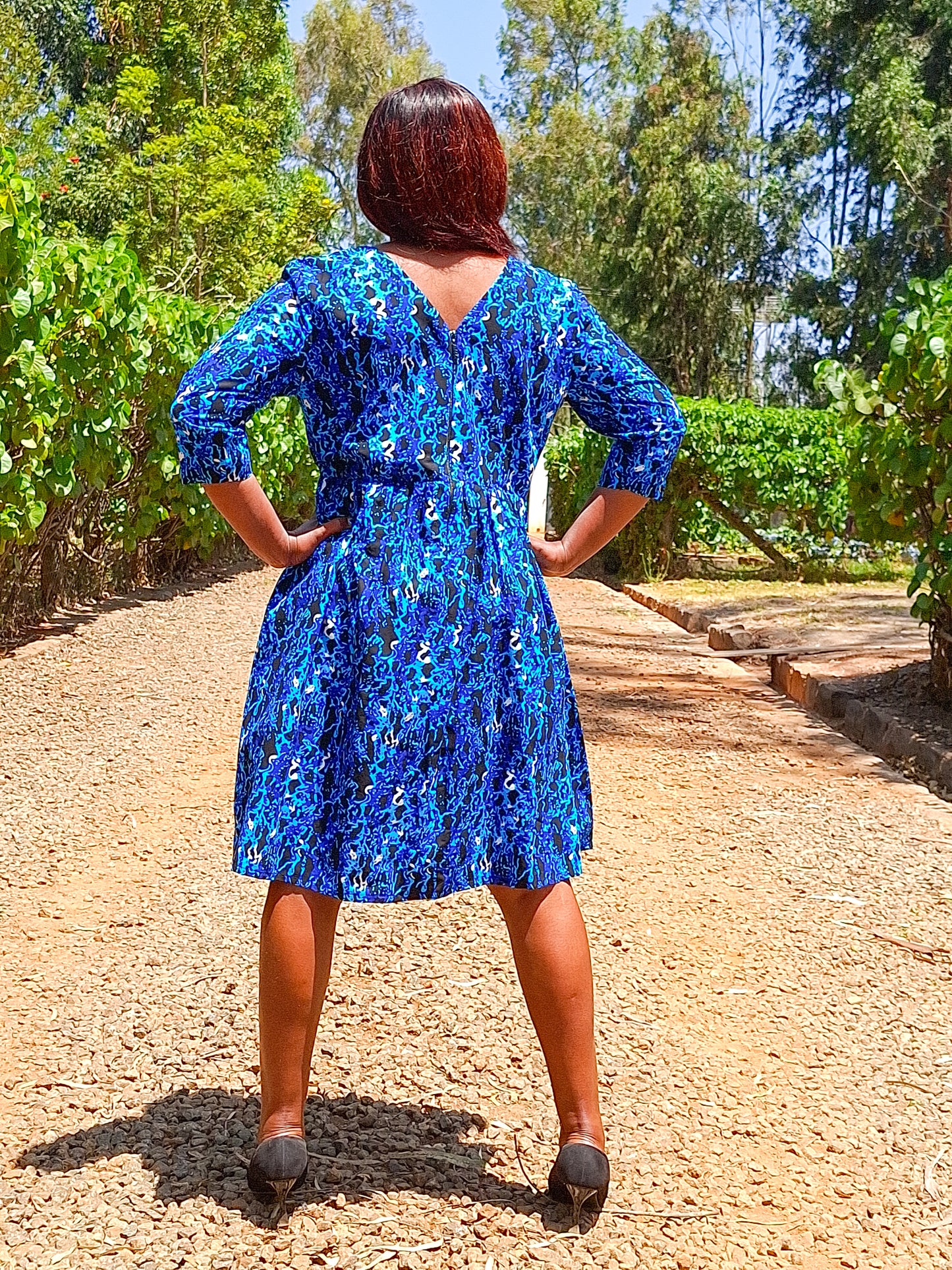 A-Line dress of black, navy blue, White  and turqouise floral  Motif