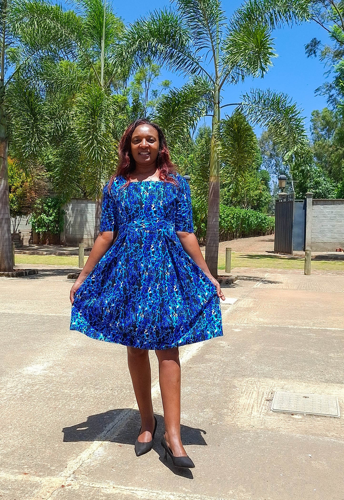 A-Line dress of black, navy blue, White  and turqouise floral  Motif