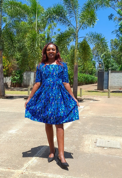 A-Line dress of black, navy blue, White  and turqouise floral  Motif