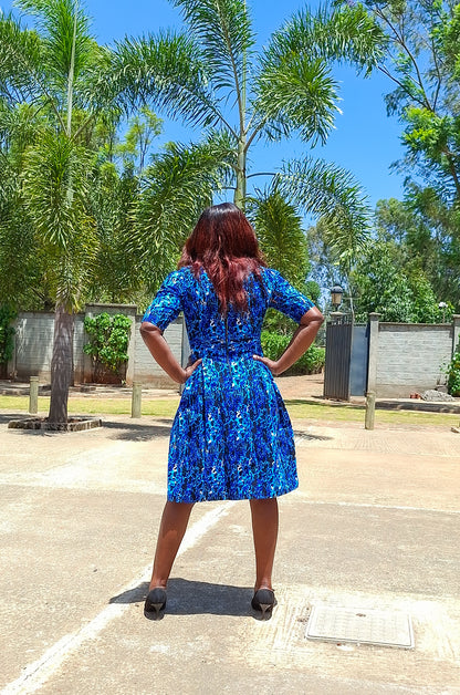 A-Line dress of black, navy blue, White  and turqouise floral  Motif