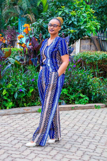 Two Piece navy blue wth white, peach dots and lines motif