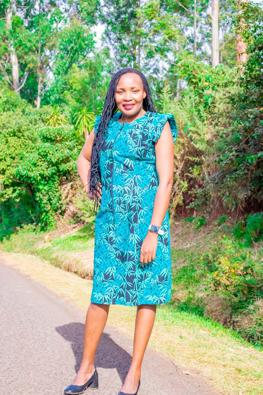 Sheath dress of back, light blue and turqoise floral motif.