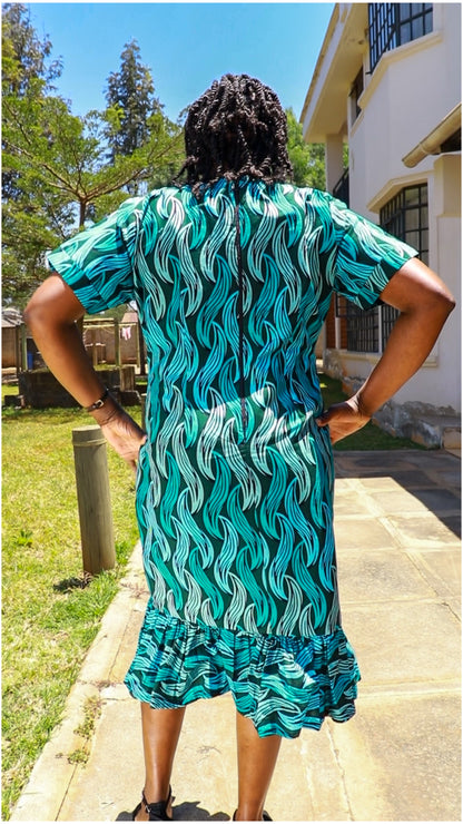 Sheath -  turquoise blue, light blue and dark green  leafy motif.