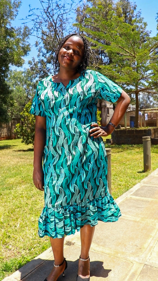 Sheath -  turquoise blue, light blue and dark green  leafy motif.