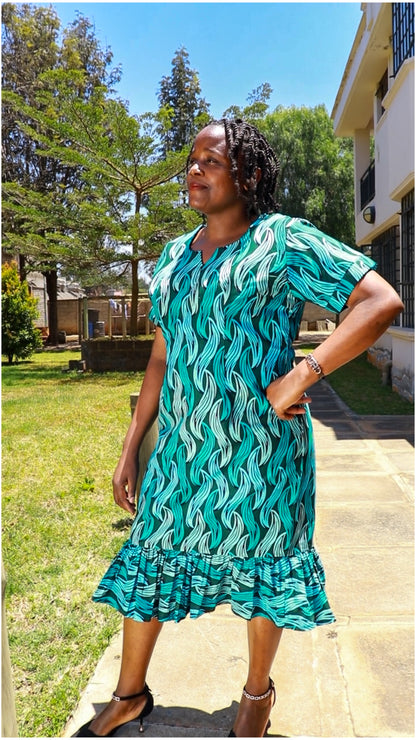 Sheath -  turquoise blue, light blue and dark green  leafy motif.