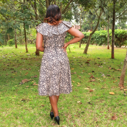 A-Line:  Dark cream with black dots motif.