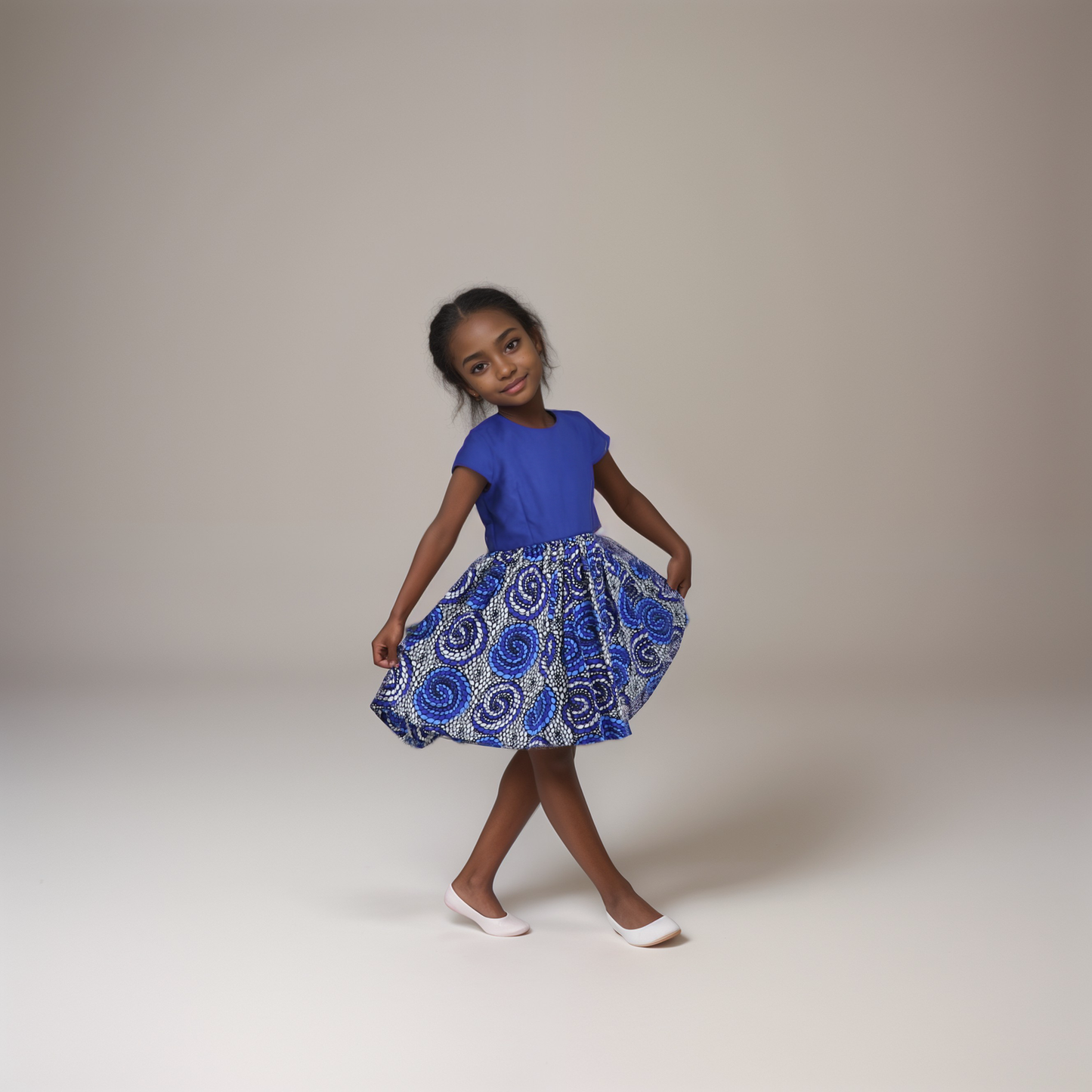 PreK-Plain navy blue bodice and skirt with navy blue light blue white and black circles/dots motif: