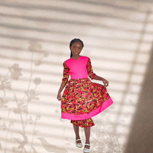 Tweens-Bodice and bottom band of pink Skirt and ruffles  of pink cream brown and black colors motif