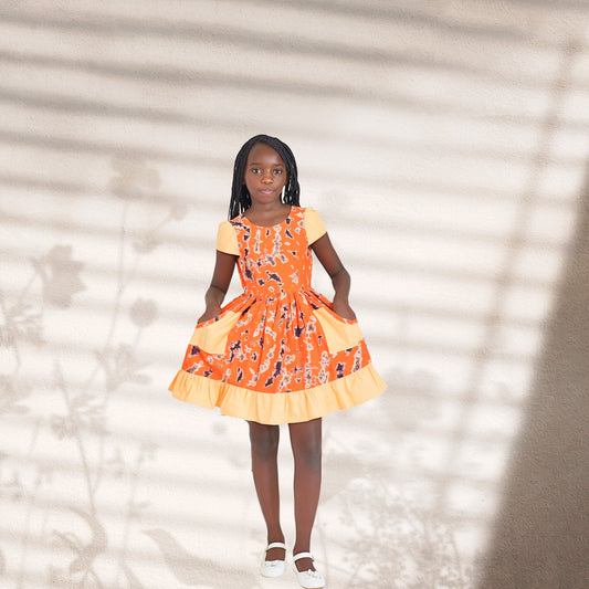 Primary-Orange black and cream motif orange cap sleeves and orange ruffles