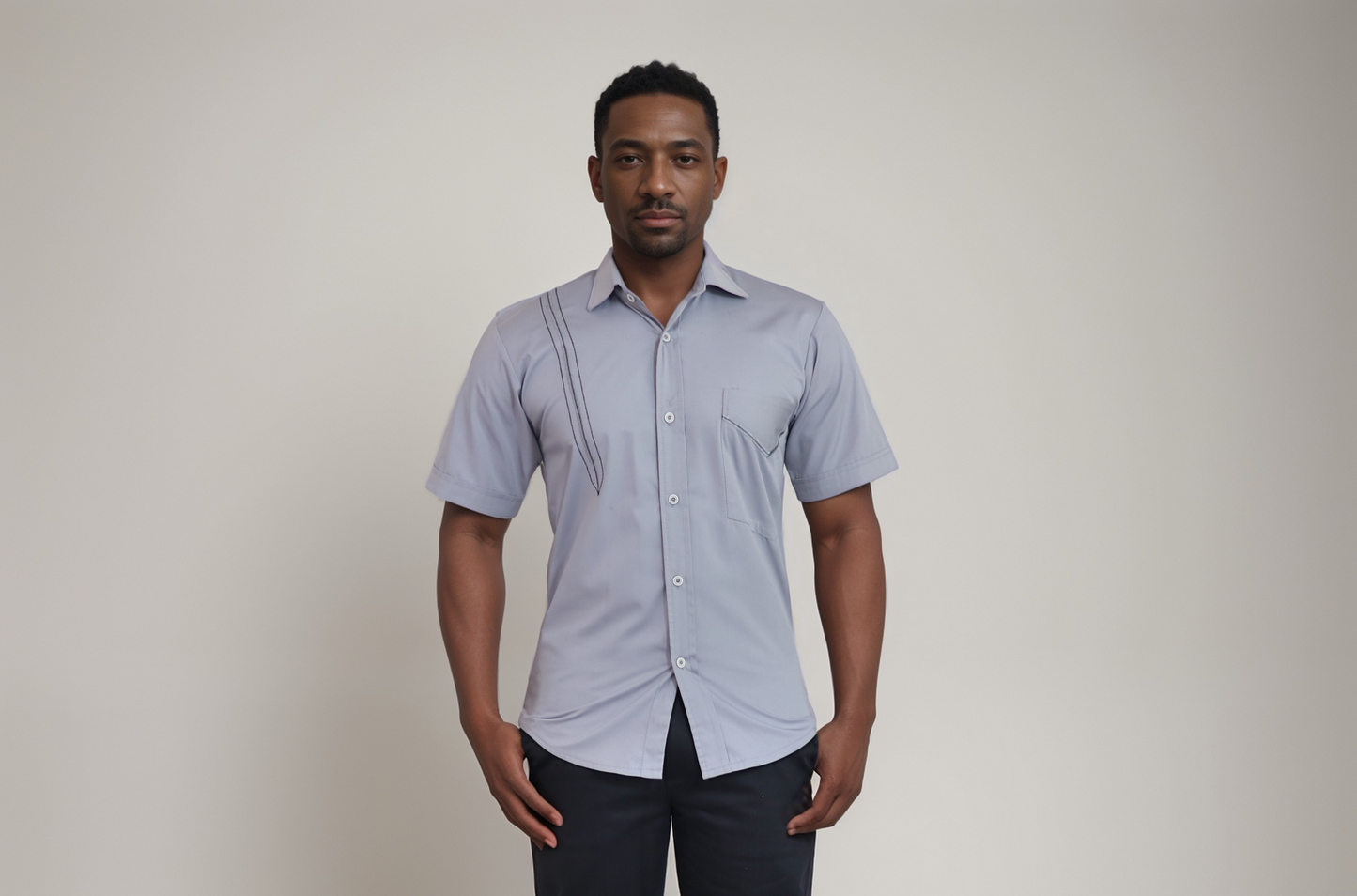 Short sleeve shirt - Light Grey colour polyester/cotton.   Round neck with embroidered plaket and pocket.