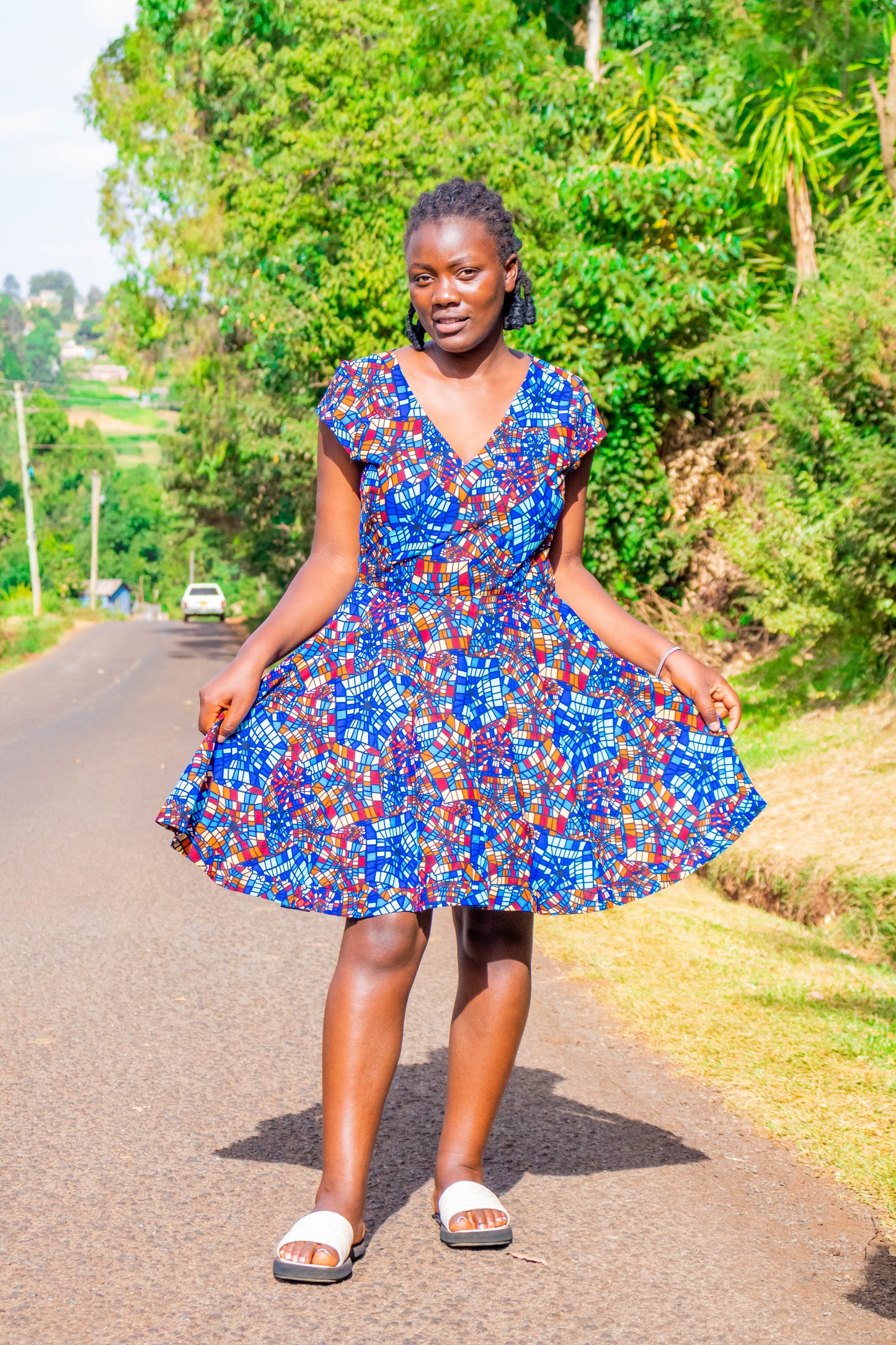 A-Line dress of navy blue, Light blue, brown white and cream prints