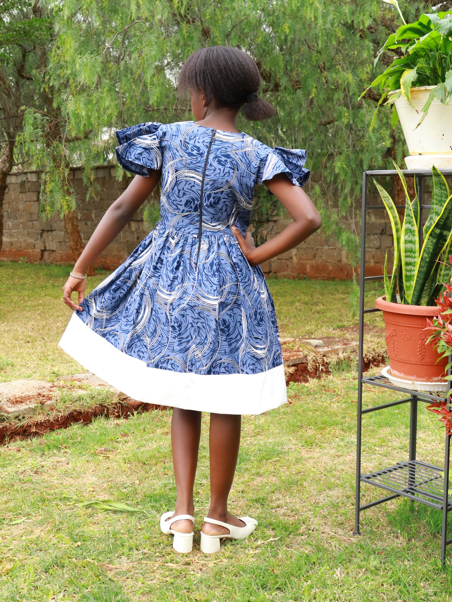 Tweens dress: African print: blue/ grey / white Neckline, bottom dress  white.