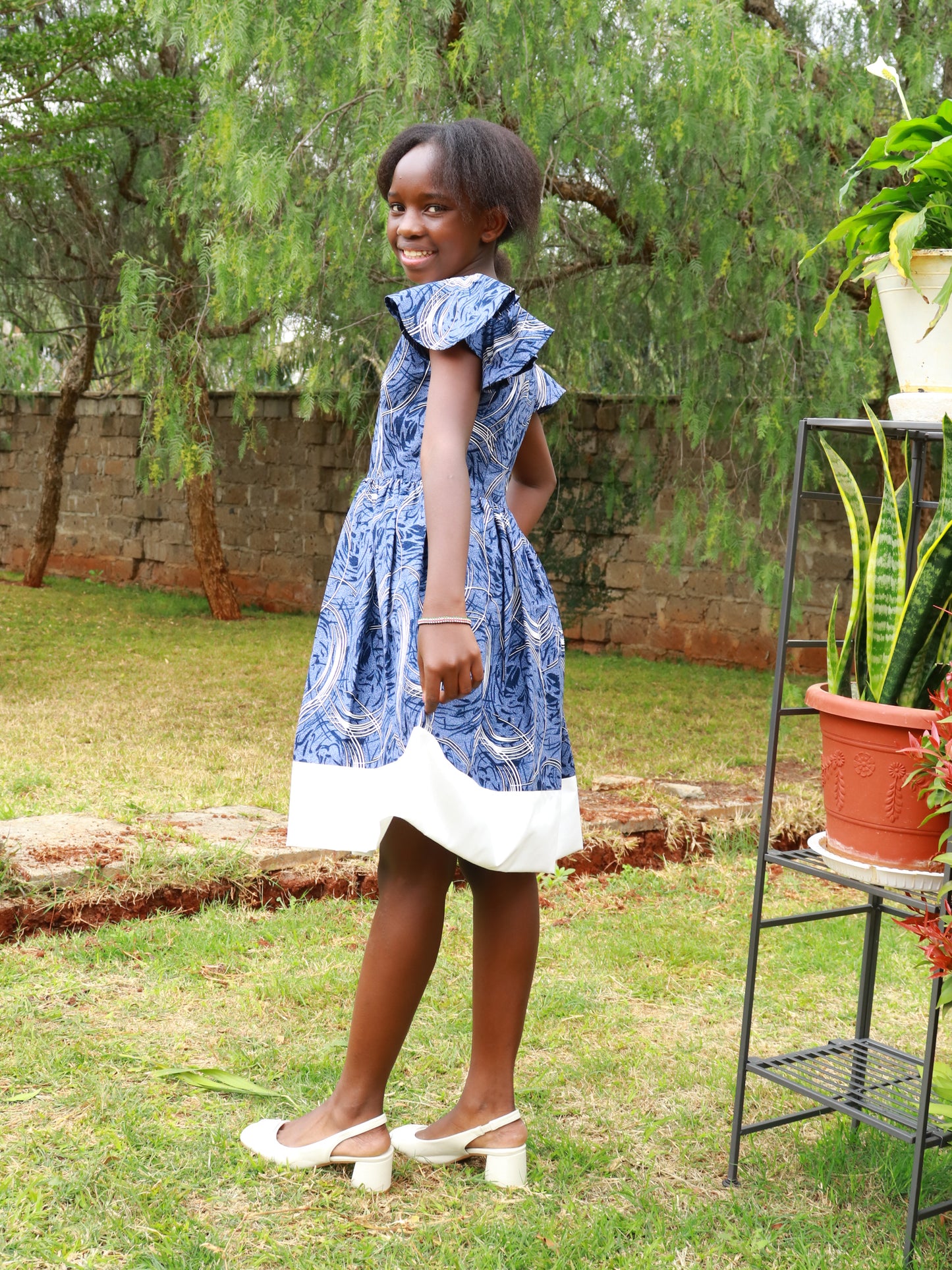 Tweens dress: African print: blue/ grey / white Neckline, bottom dress  white.