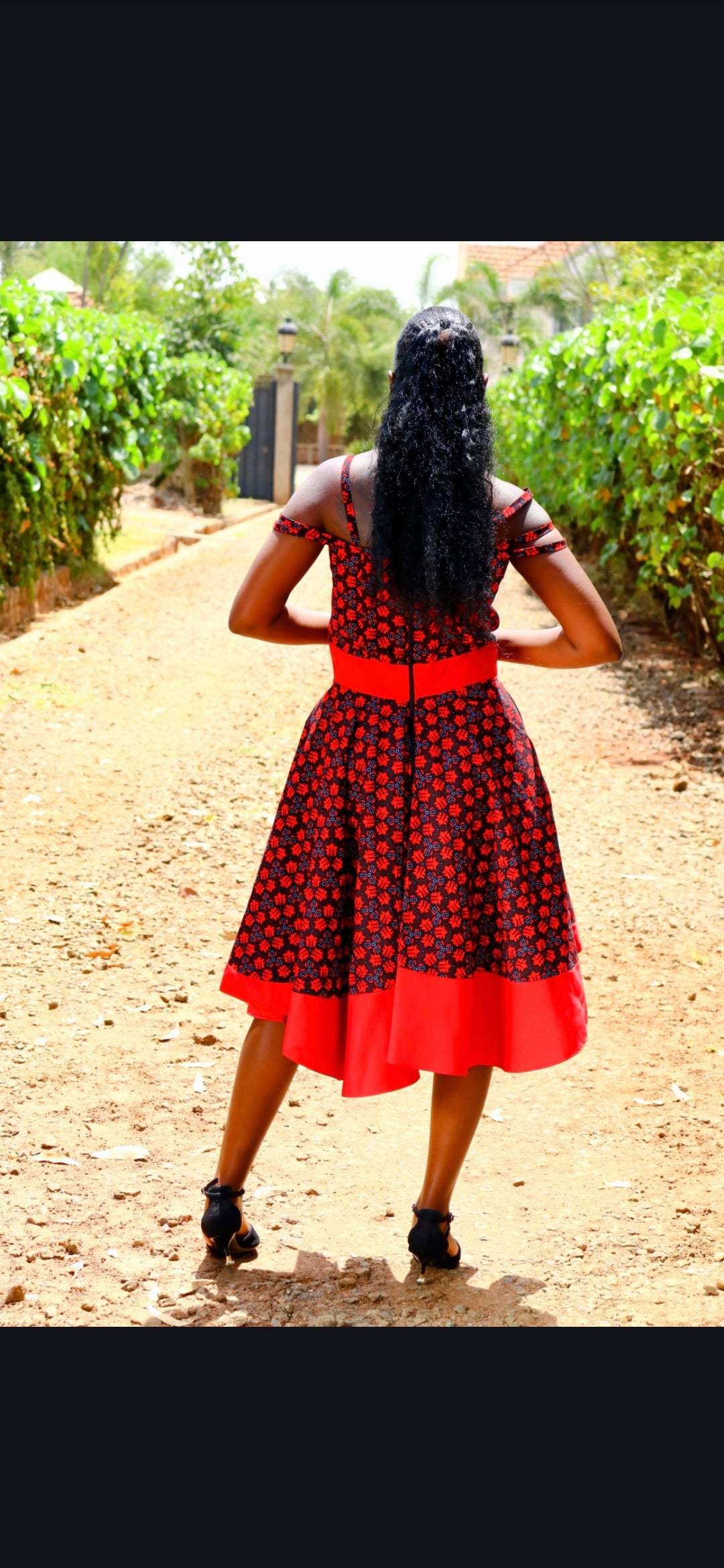 Rufflette dress- Back and red  and white  dot floral motif. Plain red contrast