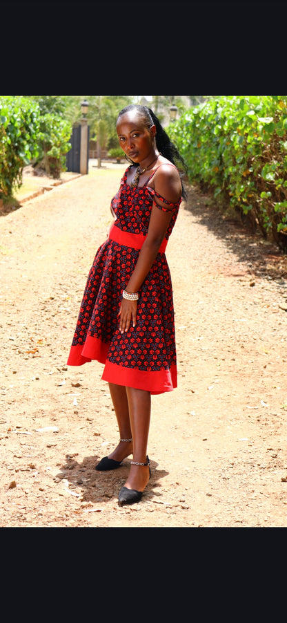Rufflette dress- Back and red  and white  dot floral motif. Plain red contrast