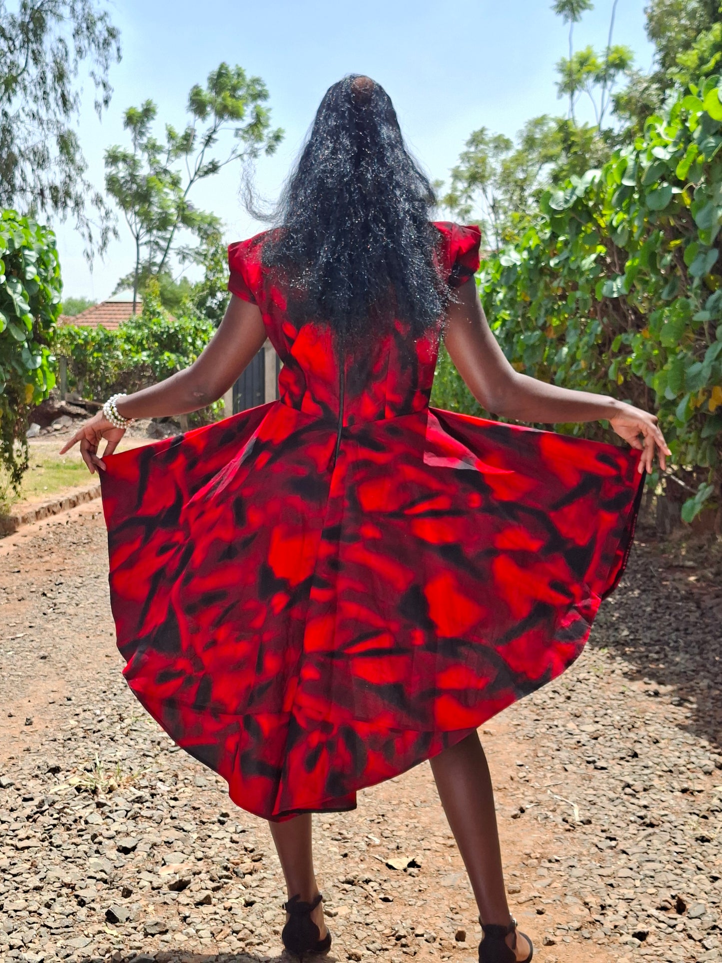 Rufflette dress: black and red prints with plain red contrast